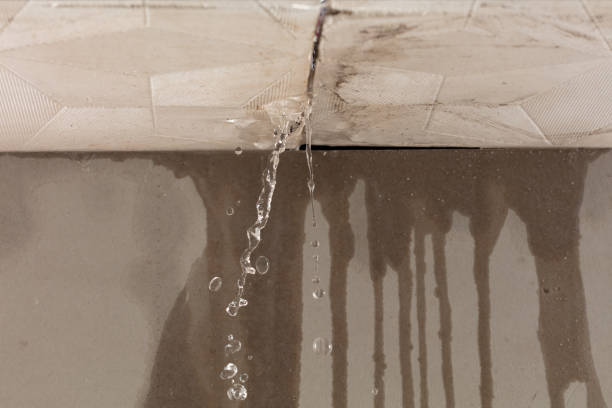 Professional Flood Damage Cleanup technician working in Edinboro, PA